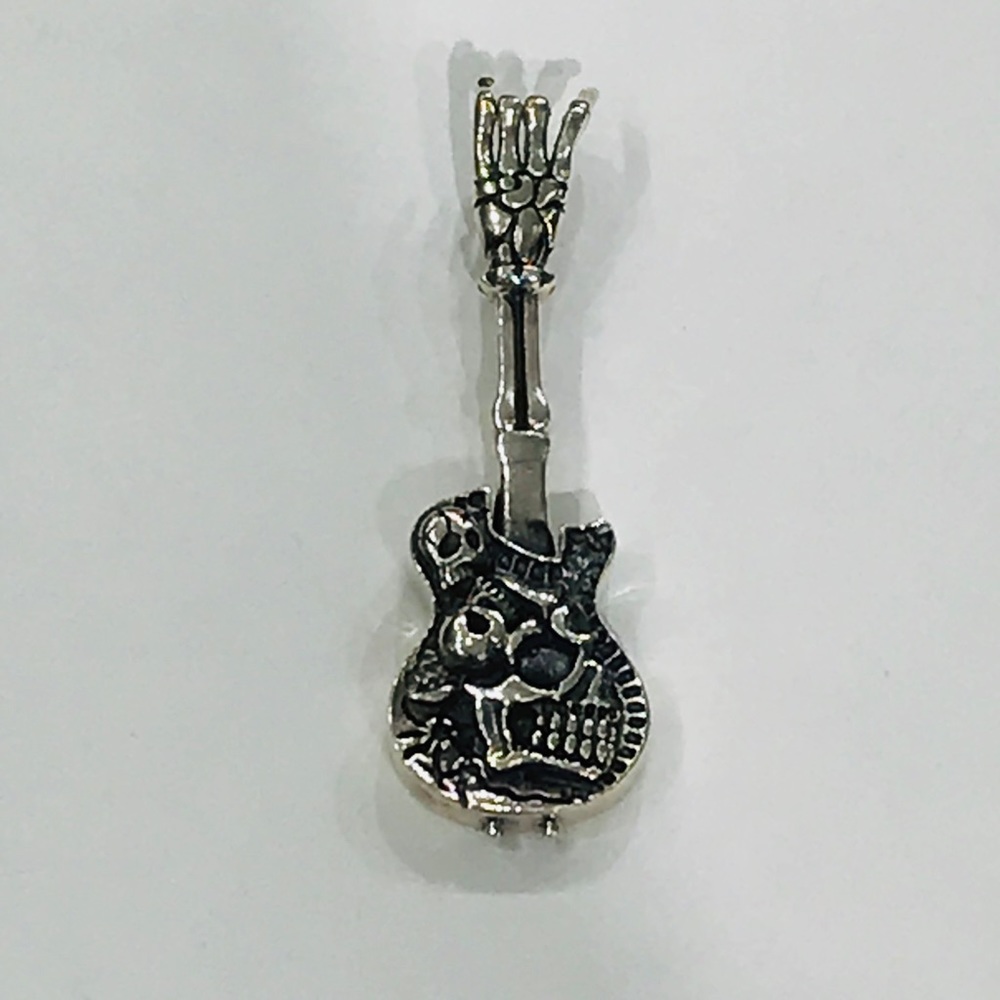 925 sterling silver Guittar pendent with skulls